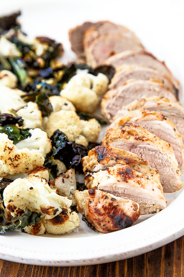 Easy pork tenderloin baked with roasted vegetables