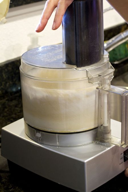 Processing almond meal and confectioners' sugar
